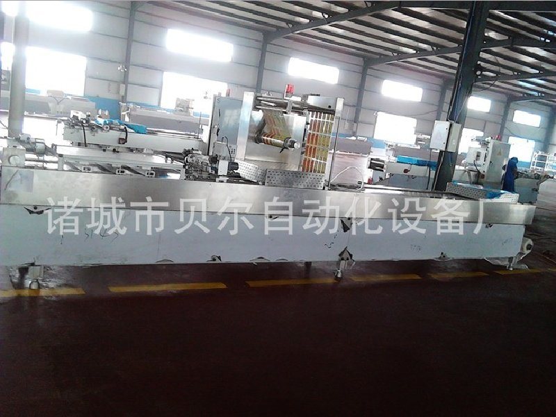 供應(yīng)山東諸城貝爾牌鹵蛋全自動拉伸膜真空包裝機(jī)價格